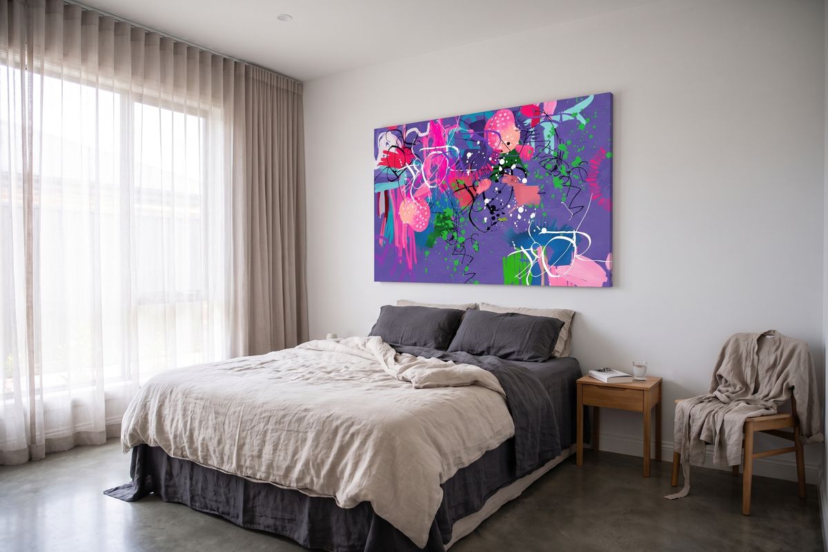 Minimal home, main bedroom, with a child's design on stretched canvas